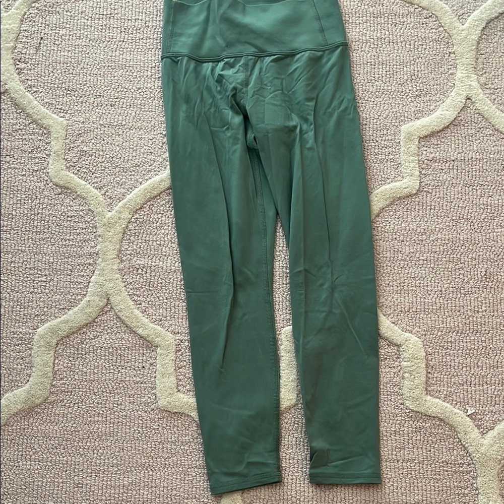 Green leggings